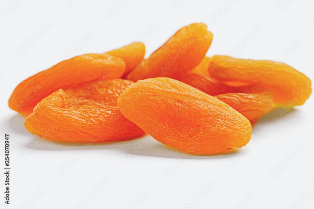 dried apricots on a white background dried apricots on a white background