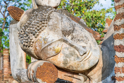 Reclining Buddha statue at Wat Phra Kaeo temple in Kamphaeng Phet Historical Park, UNESCO World Heritage site