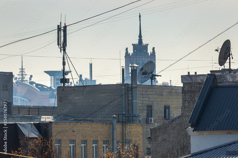 Early spring at sunny evening in warm weather. High rise residential areas around old historic center on the right bank of the Dnipro River. Ukraine Mar. 6, 2019 Early spring at sunny evening in warm weather. High rise residential areas around old historic center on the right bank of the Dnipro River. Ukraine Mar. 6, 2019