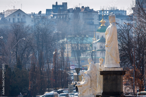 Early spring at sunny evening in warm weather. Monument to Princess Olga, holy Apostle Andriy Pervozvannym and enlighteners Cyril and Methodius. Kyiv, Ukraine Mar. 6, 2019