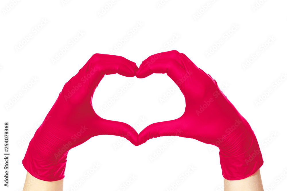 Obraz premium Female hands in pink gloves hold fingers in the shape of a heart isolated on white background