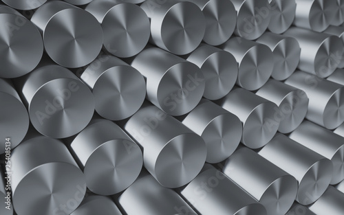 Close-up set of metal round kernels and bars. Industrial metallic background