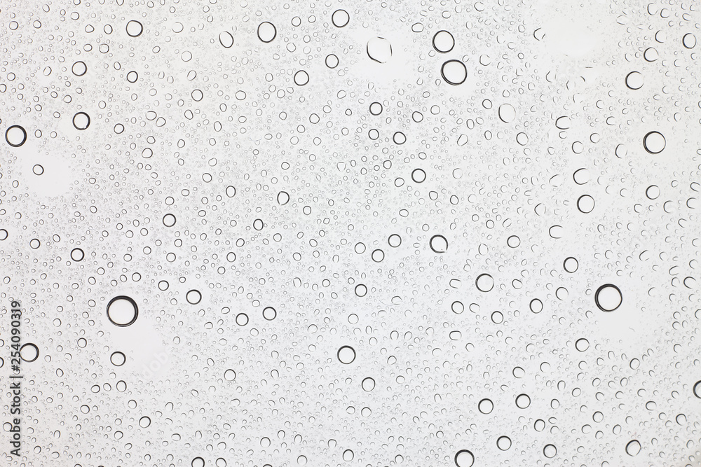 Rain droplets on glass background, Water drops on glass. Rain droplets on glass background, Water drops on glass.