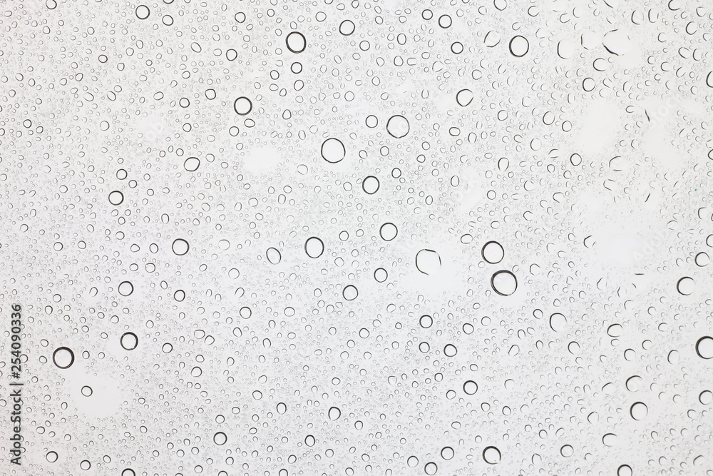 Rain droplets on glass background, Water drops on glass. Rain droplets on glass background, Water drops on glass.
