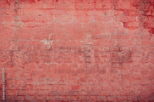 Old brick wall with scratches, cracks, dust, crevices, roughness. Can be used as a poster or background for design. © INTHEBLVCK