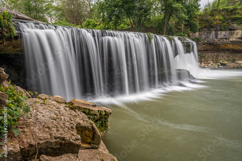 Plunging Indiana Waterfall - Mill Creek plunges over Upper Cataract Falls  a beautiful waterfall in rural Owen County  Indiana.