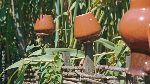 Pots on a fence - Ukrainian culture and authenticity photo