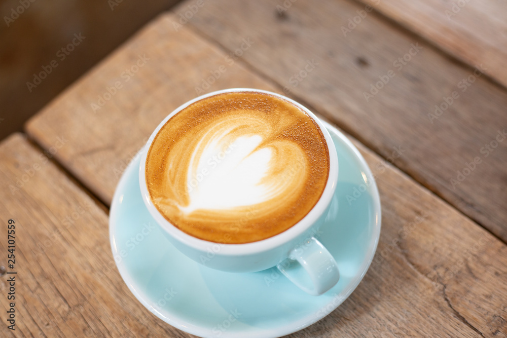 Latte arts coffe hot coffee on wooden table.barista art concept. Latte arts coffe hot coffee on wooden table.barista art concept.
