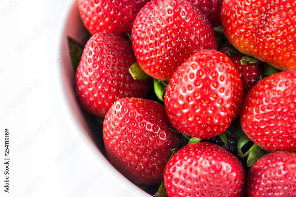 Fresh Strawberries in White ceramic bowl Fresh Strawberries in White ceramic bowl