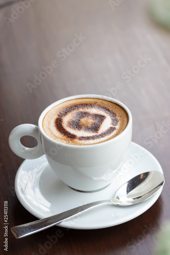 Hot coffee in the morning in a white ceramic cup
