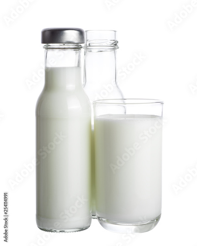 Milk in glass and bottle isolated on white background.