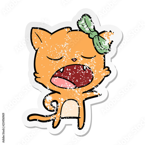 distressed sticker of a cartoon yawning cat