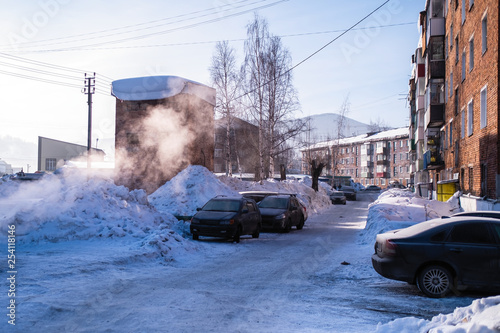 On one of the streets in Sheregesh urban-type settlement, Mountain Shoria, Siberia - Russia. photo