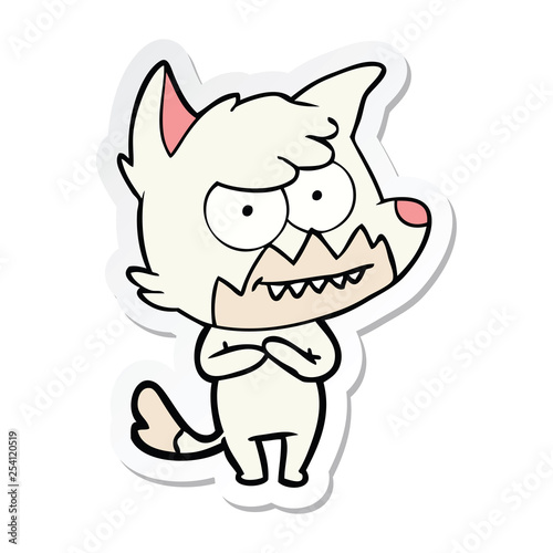 sticker of a cartoon grinning fox