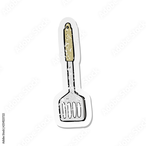 retro distressed sticker of a cartoon kitchen spatula