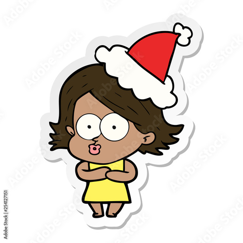 sticker cartoon of a girl pouting wearing santa hat