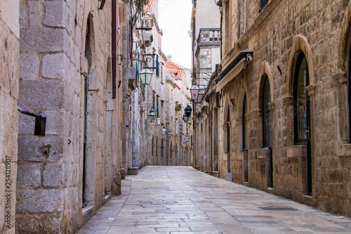 Old narrow street in Dubrovnik , Croatia