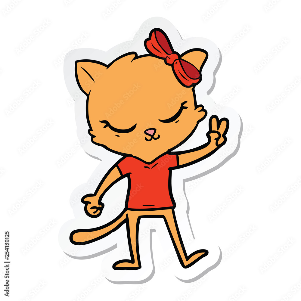 sticker of a cute cartoon cat with bow