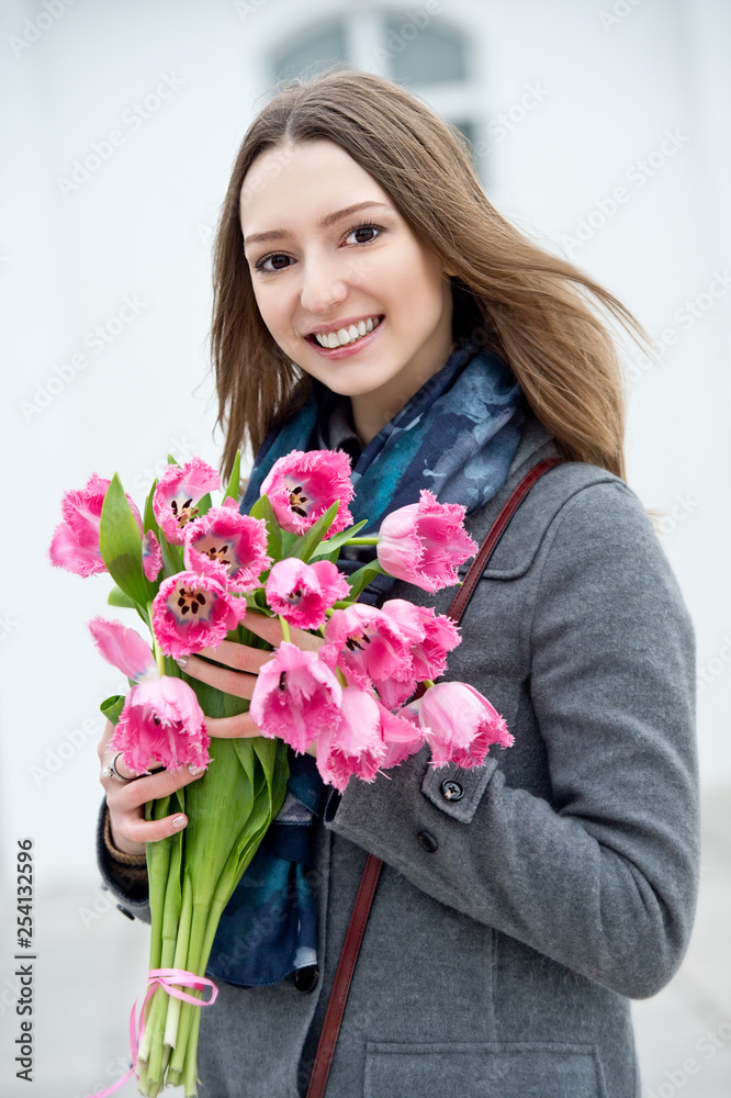 Woman with tulips. Beautiful woman with flowers. Woman with tulips. Beautiful woman with flowers.
