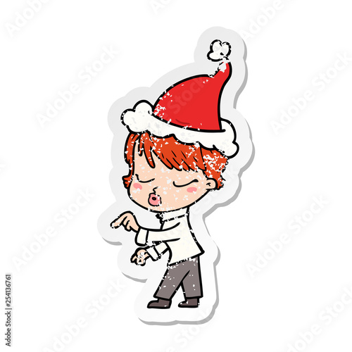 distressed sticker cartoon of a woman with eyes shut wearing santa hat