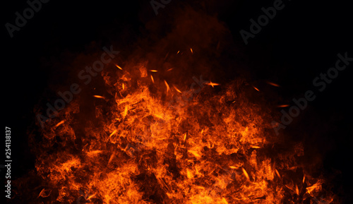 Fire, heat, passion, texture. Fire particles embers background . Design element.