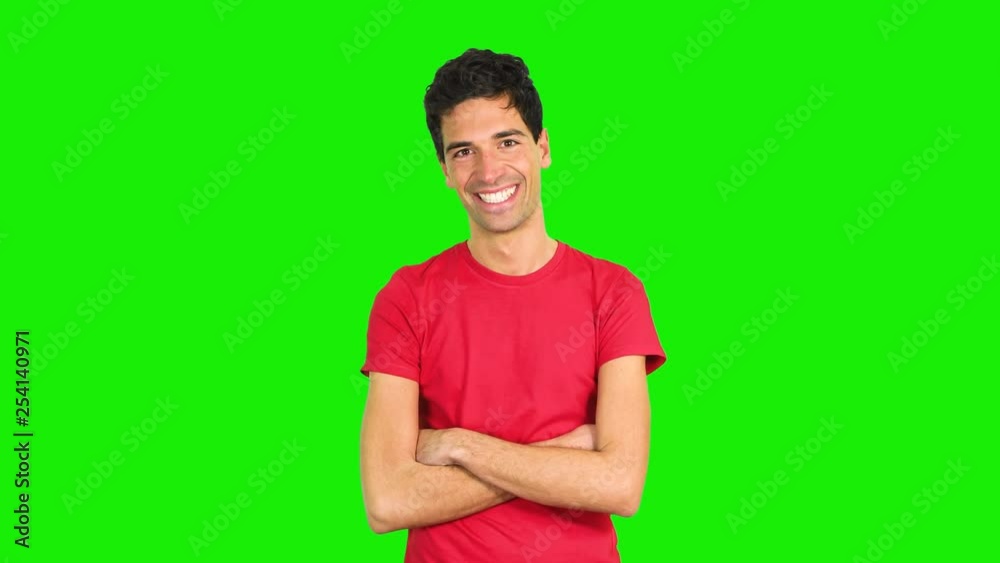 Man in a casual look smiling isolated on green screen chroma key Man in a casual look smiling isolated on green screen chroma key