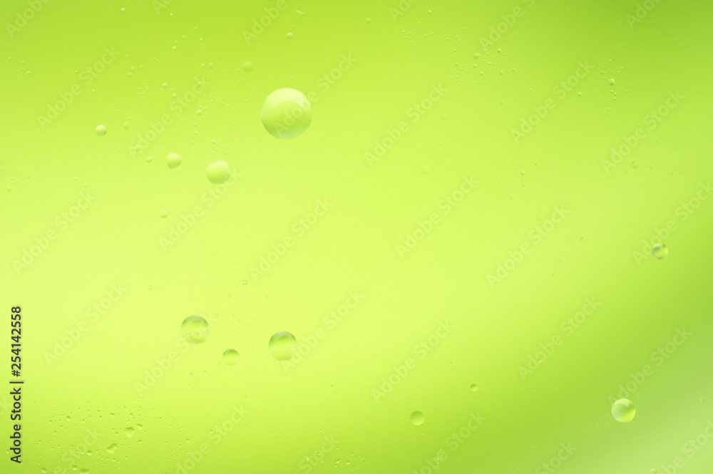 Green abstract background with drops