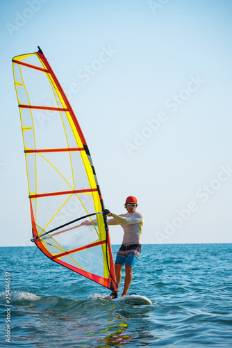 windsurfer at the sea. board. man.