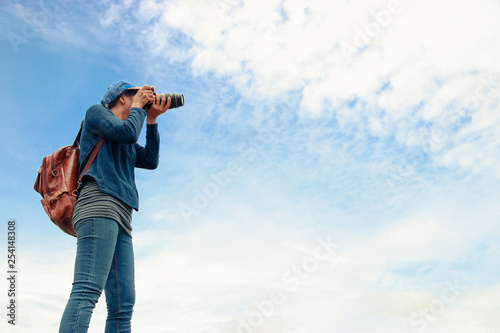 Female photographer in high view.