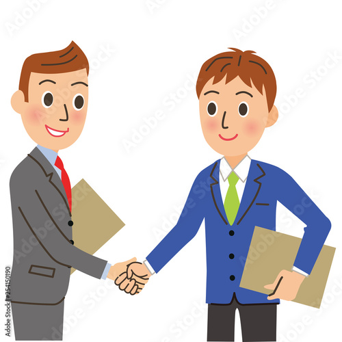 握手をする会社員