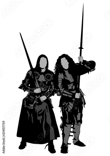 Young women in old knightly clothes on white background