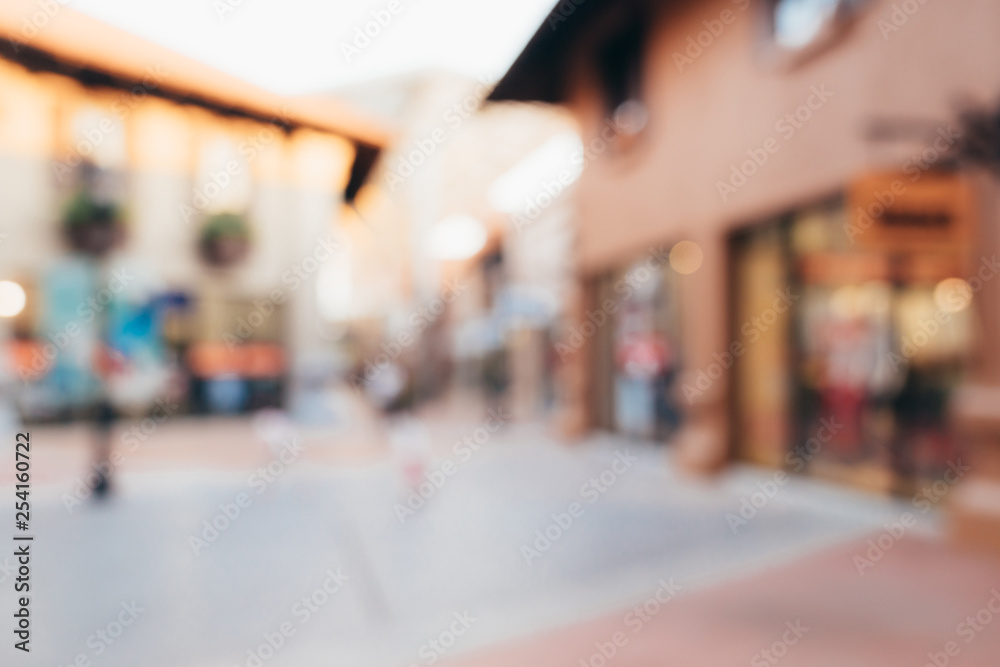 Obraz premium Vintage tone blurred defocused day of crowd people in walking street festival and shopping mall.