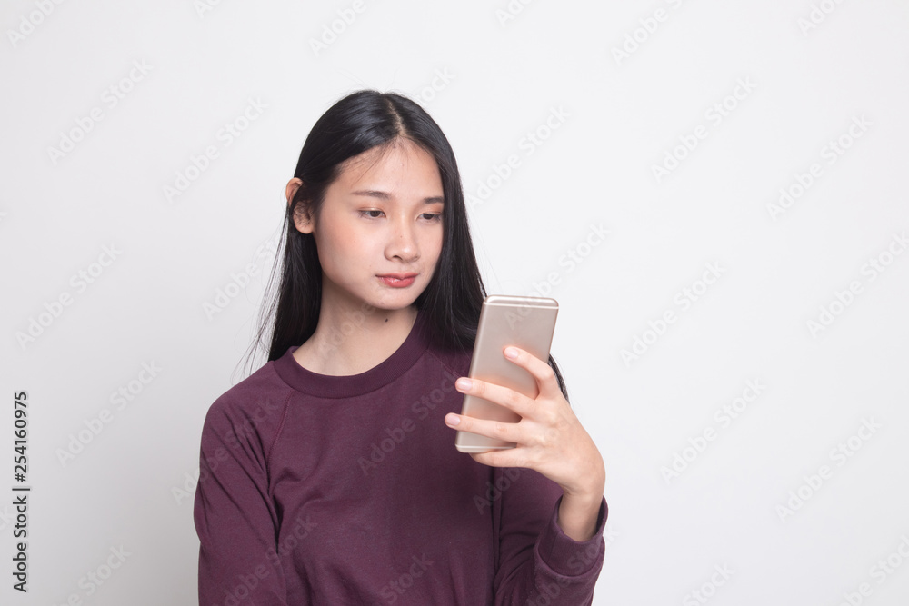 Young Asian woman with mobile phone. Young Asian woman with mobile phone.