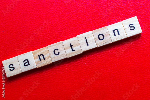 Inscription letters close up sanctions. Concept Horizontal photo