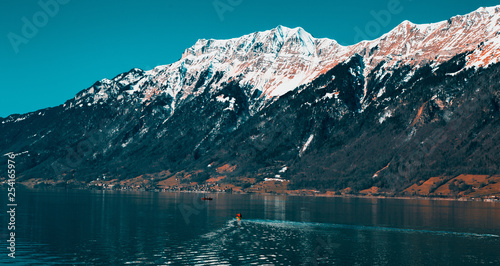 Village  in Swiss apls montains lake photo