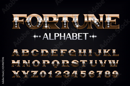 Fortune alphabet font. Vintage golden letters and numbers with diamond gemstones. Stock vector typescript for your design.