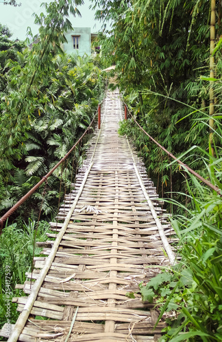 Beautiful braided bridge over the river under the Dempo mountain. Pagar Alam area, South Sumatra, Indonesia photo