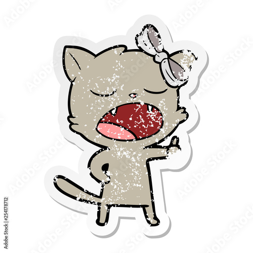 distressed sticker of a cartoon yawning cat