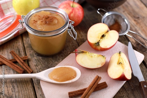 Wallpaper Mural fresh homemade apple jam , apple puree, with cinnamon, fresh apples and a wooden spoon on wooden rustic table Torontodigital.ca