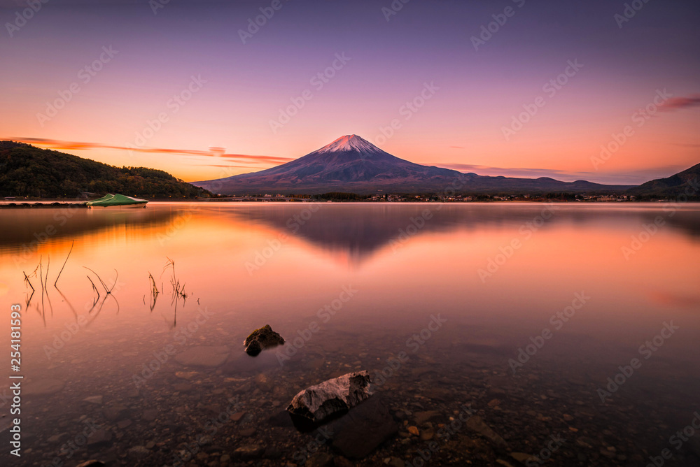 Landscape image of Mt. Fuji over Lake Kawaguchiko at sunrise in Fujikawaguchiko, Japan.