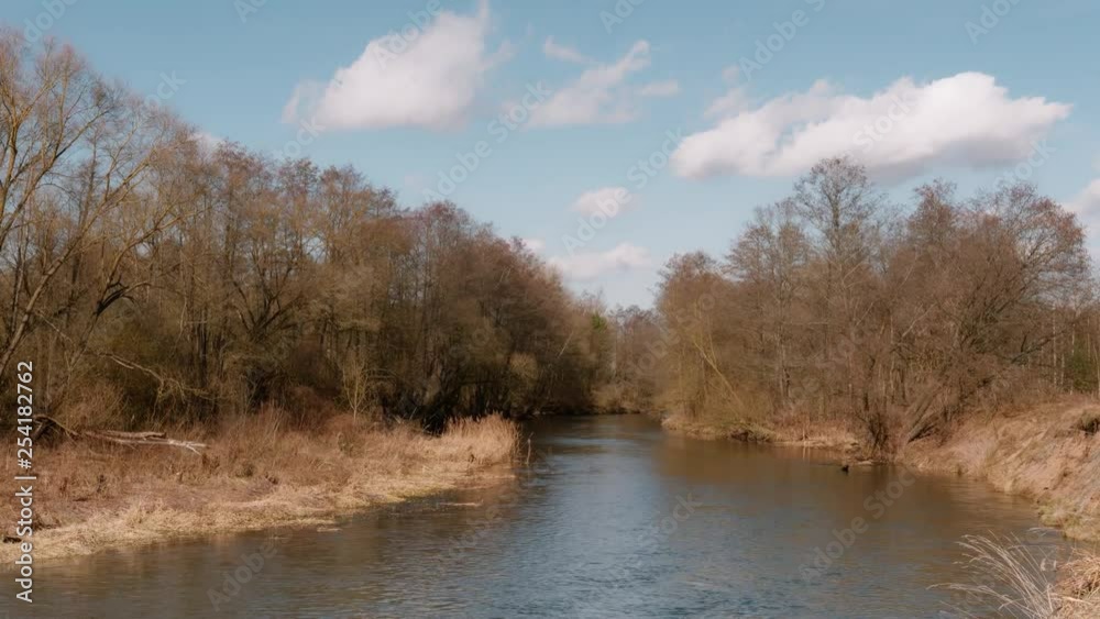 the beginning of spring. wild fast river among the thickets the beginning of spring. wild fast river among the thickets