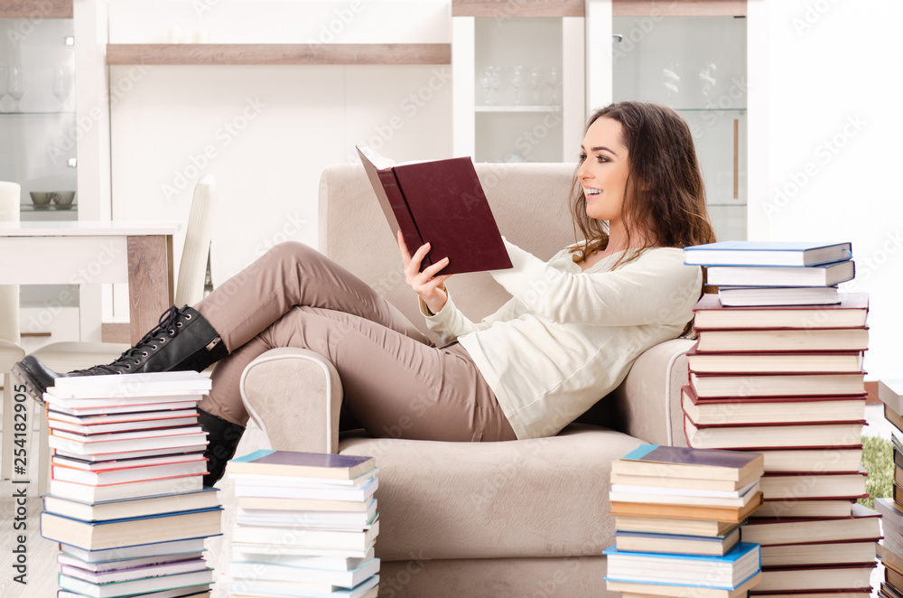 Young female student preparing for exams at home Young female student preparing for exams at home