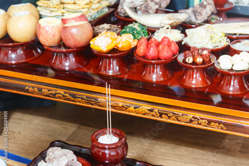 Table setting with various fruits and foods for Korean traditional Holiday photo