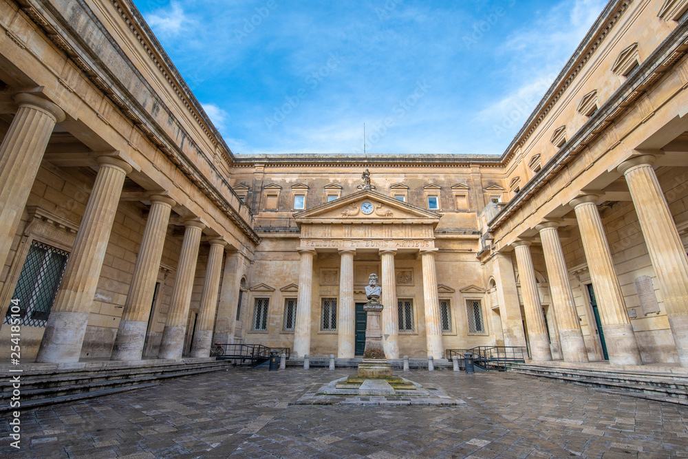 Lecce, Puglia, Italy - Public library and Principal facade of Convitto Palmieri with the bust of Giosue Carducci in Piazzetta Carducci square of Lecce. Apulia