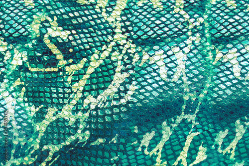 Blue neon snakeskin texture in the style of the eighties. Background