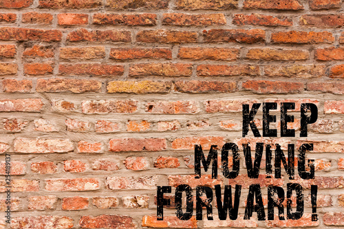 Handwriting text writing Keep Moving Forward. Conceptual photo Optimism Progress Persevere Move Brick Wall art like Graffiti motivational call written on the wall