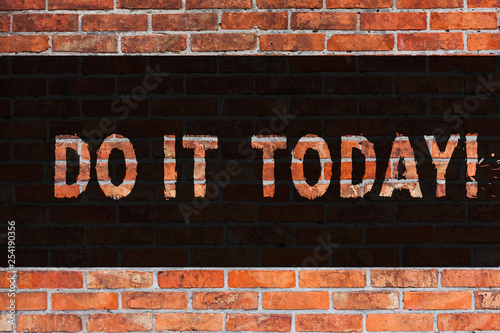 Text sign showing Do It Today. Business photo showcasing Start working doing something needed now Brick Wall art like Graffiti motivational call written on the wall photo