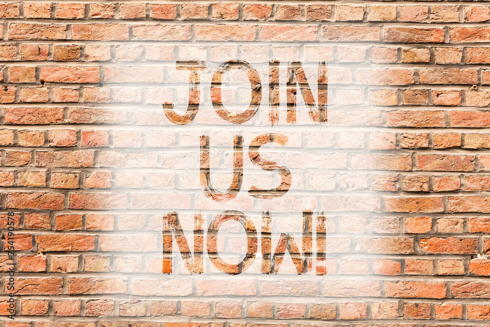 Text sign showing Join Us Now. Business photo text Enroll in community Register in website or form Recruit Brick Wall art like Graffiti motivational call written on the wall Text sign showing Join Us Now. Business photo text Enroll in community Register in website or form Recruit Brick Wall art like Graffiti motivational call written on the wall
