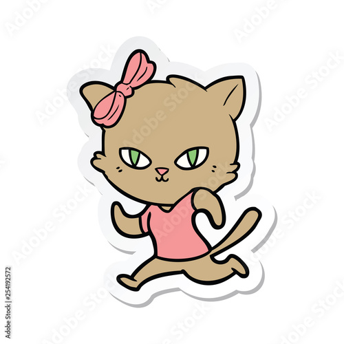 sticker of a cute cartoon cat jogging
