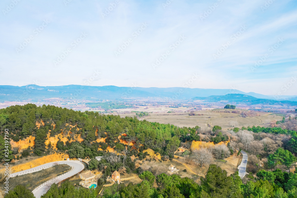 Editorial illustrative. Roussillon Provence France. February 9, 2019. Tourist village. The road to the canyon.Far horizon.